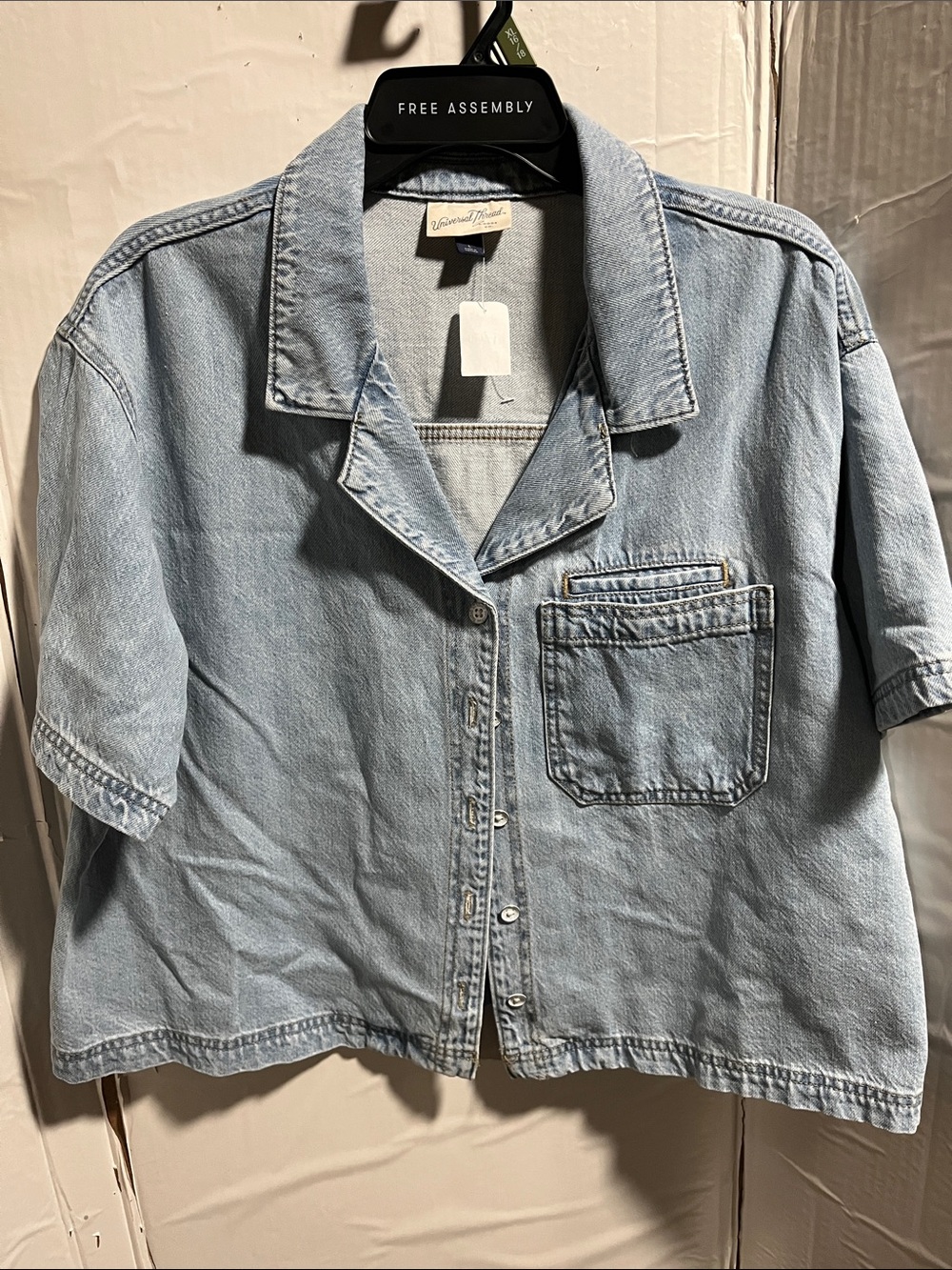 Light Wash Denim Button-Up Shirt Jacket with graphic on the back. Positive Mssg.